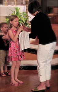 Eucharist Minister w Child